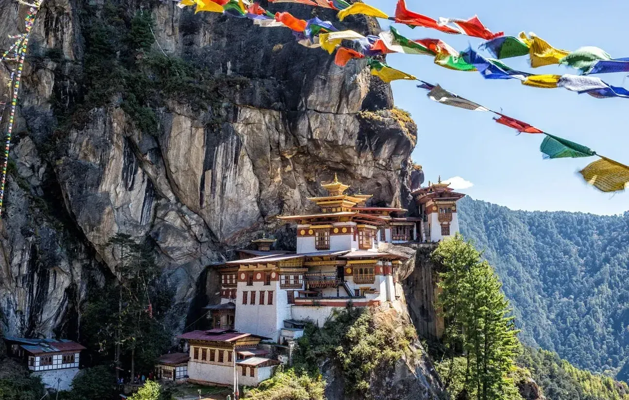 Tiger’s Nest Monastery perched on a cliffside in Bhutan, radiating high-altitude serenity and mystical energy for deep spiritual transformation.