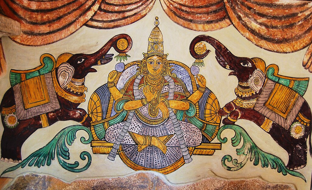 Depiction of Goddess Lakshmi seated on a lotus, radiating abundance, grace, and divine prosperity