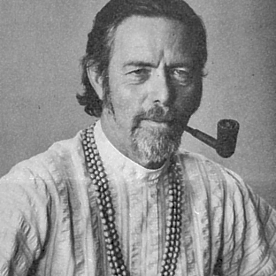 Black-and-white portrait of a Alan Watts with a pipe and mala beads, wearing a light tunic, facing the camera.