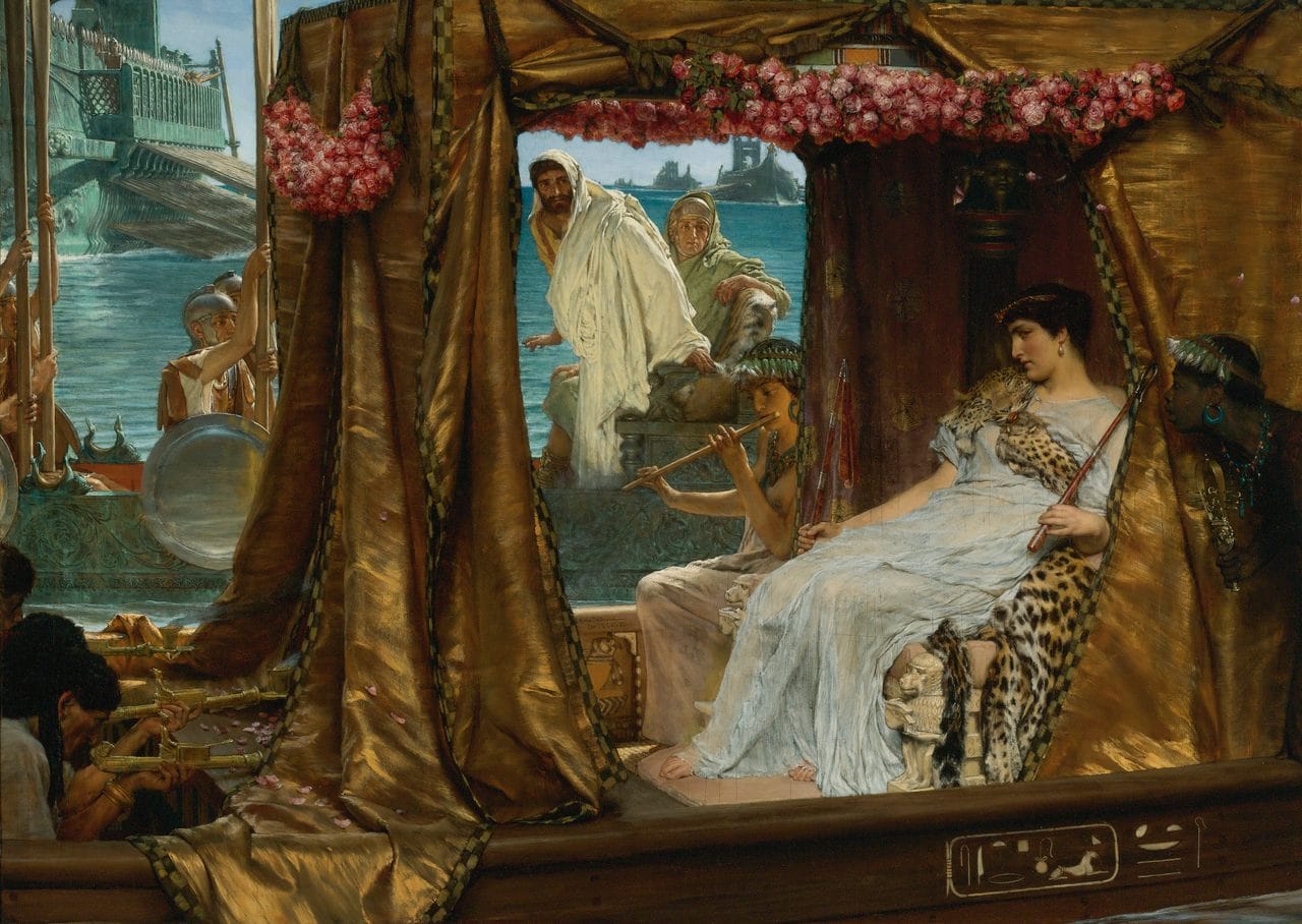 An imaginative portrayal of Cleopatra meeting Mark Antony on her perfumed barge. Historical accounts describe how Cleopatra’s ship sailed with purple, perfumed sails, its fragrance wafting to shore and enchanting onlookers.
