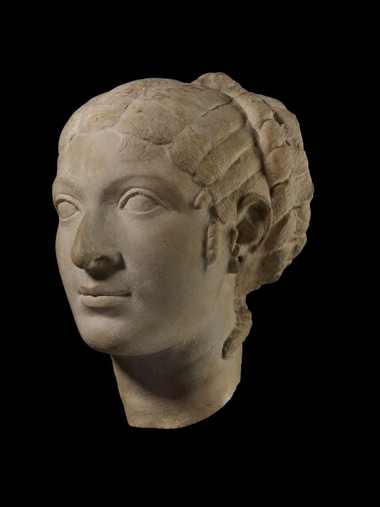 Marble bust of Cleopatra VII depicting calm authority, self-possession, and sovereign feminine power.
