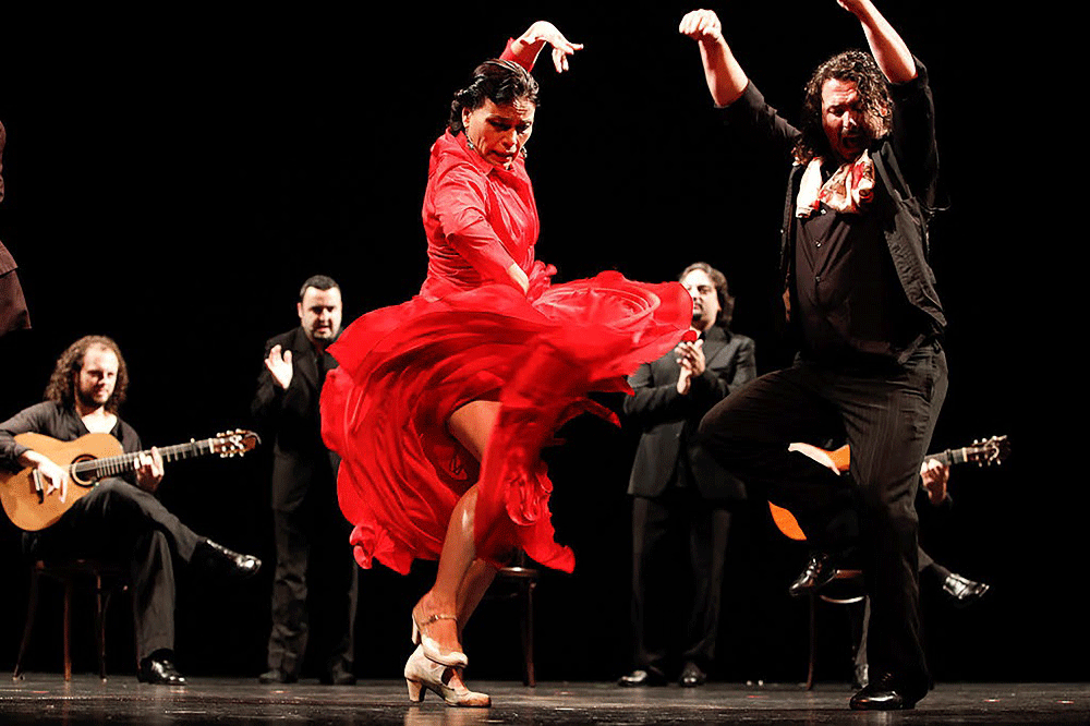 Flamenco dancers embodying duende, the raw Andalusian soul-force that overtakes artists during moments of true creation
