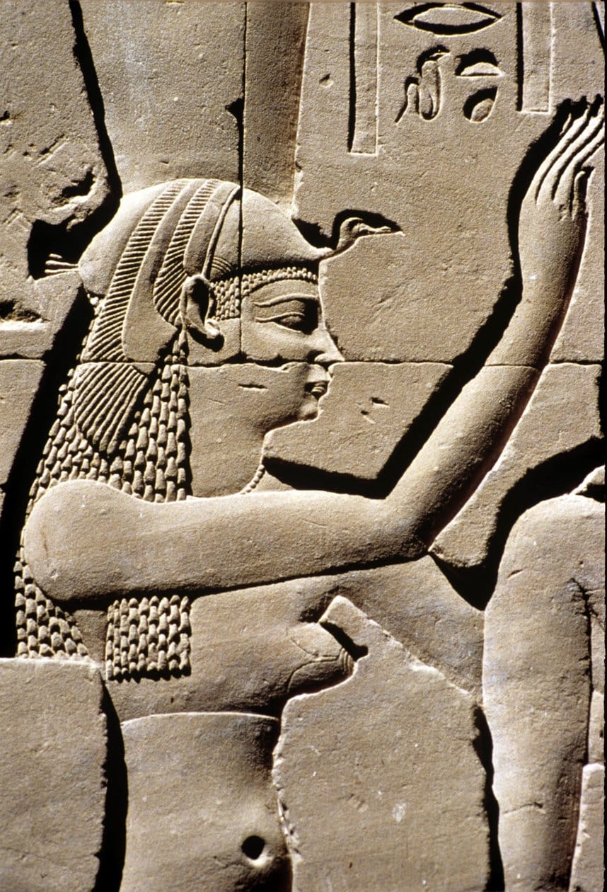 Stone relief of the goddess Isis at the Temple of Horus in Edfu, Ptolemaic Egypt.
