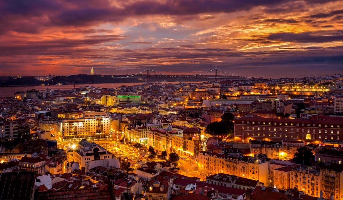 Panoramic sunset view of Lisbon from Miradouro da Senhora do Monte