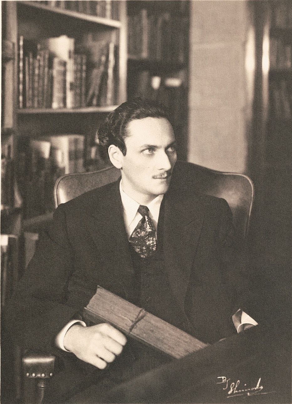 Portrait of Manly P. Hall seated in his study, philosopher and historian of esoteric traditions
