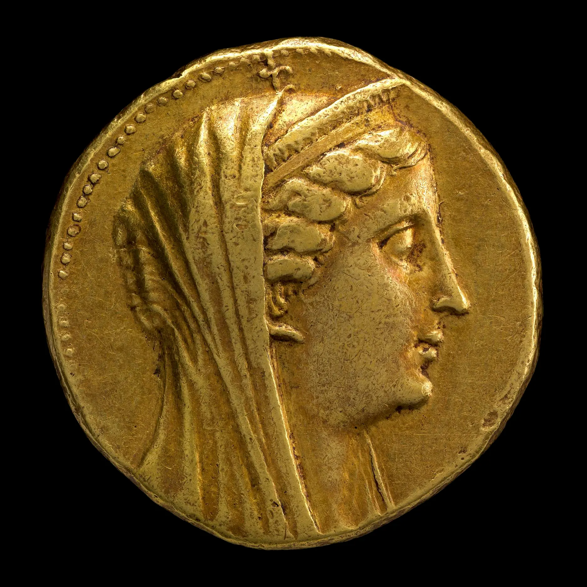 Ptolemaic gold coin depicting Queen Arsinoe II, symbol of royal authority and value