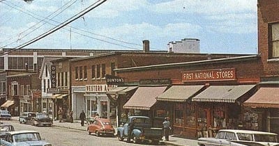 Early 1960s small-town American Main Street in color, reflecting everyday life during Esther Hicks’s teenage years