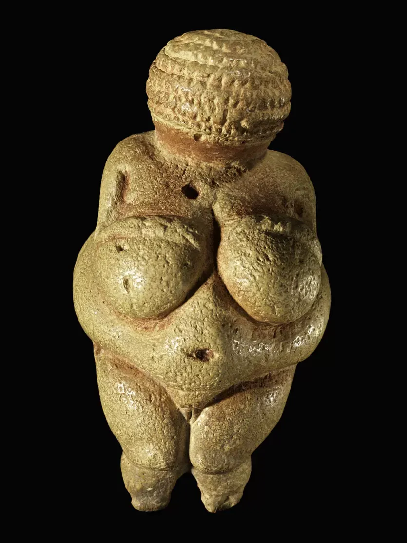 Venus of Willendorf prehistoric goddess figurine symbolizing fertility, abundance, and the divine feminine.