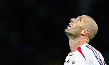 Zinedine Zidane walking off the ball with calm focus, illustrating awareness and intelligence over raw effort in football.