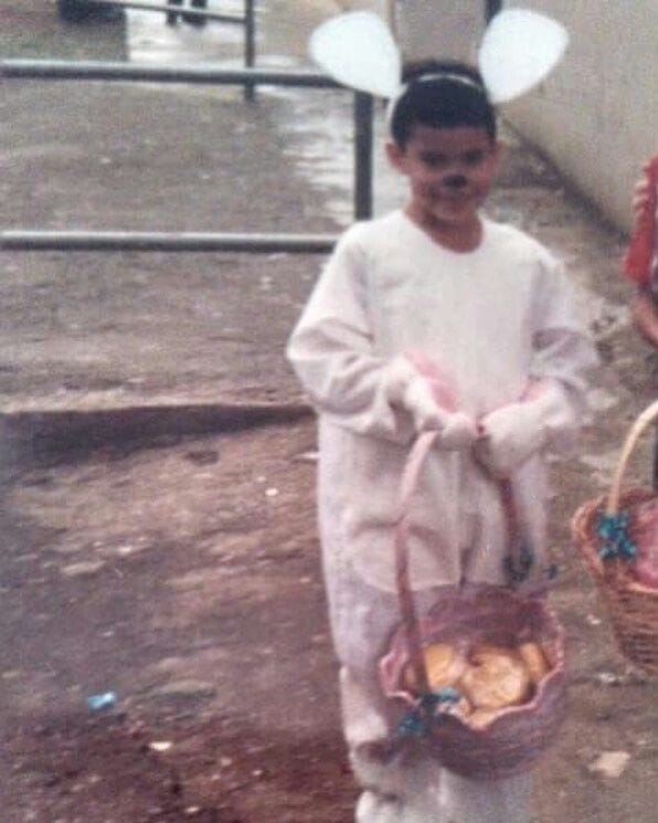 Bad Bunny as a child wearing bunny ears, an early image that later inspired his stage name.