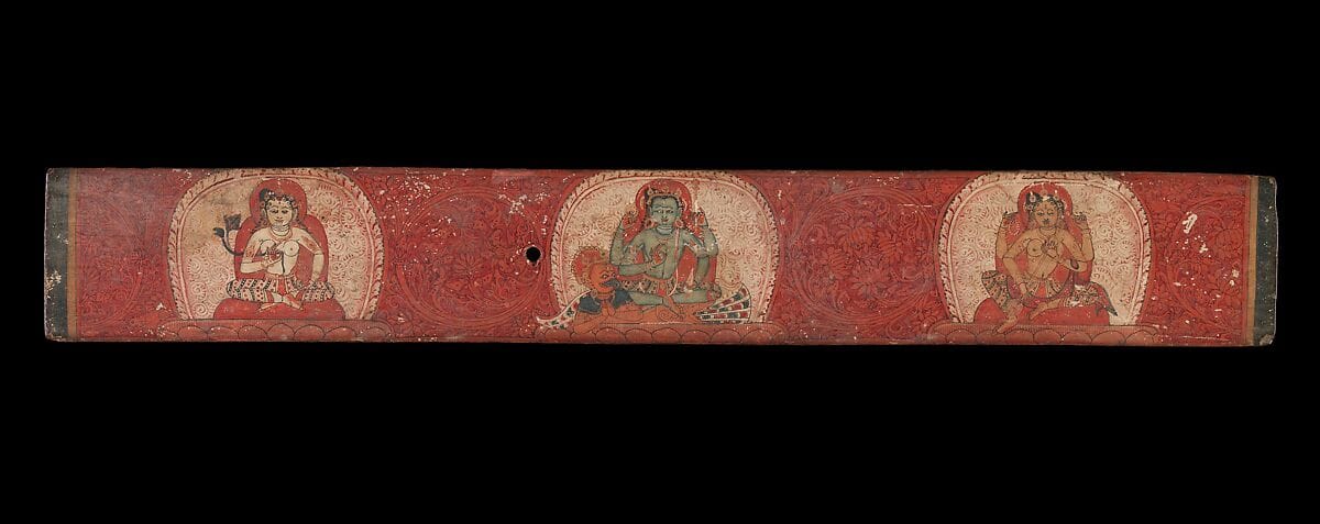 Vishnu seated between Lakshmi and Sarasvati on illuminated manuscript cover, medieval Nepal