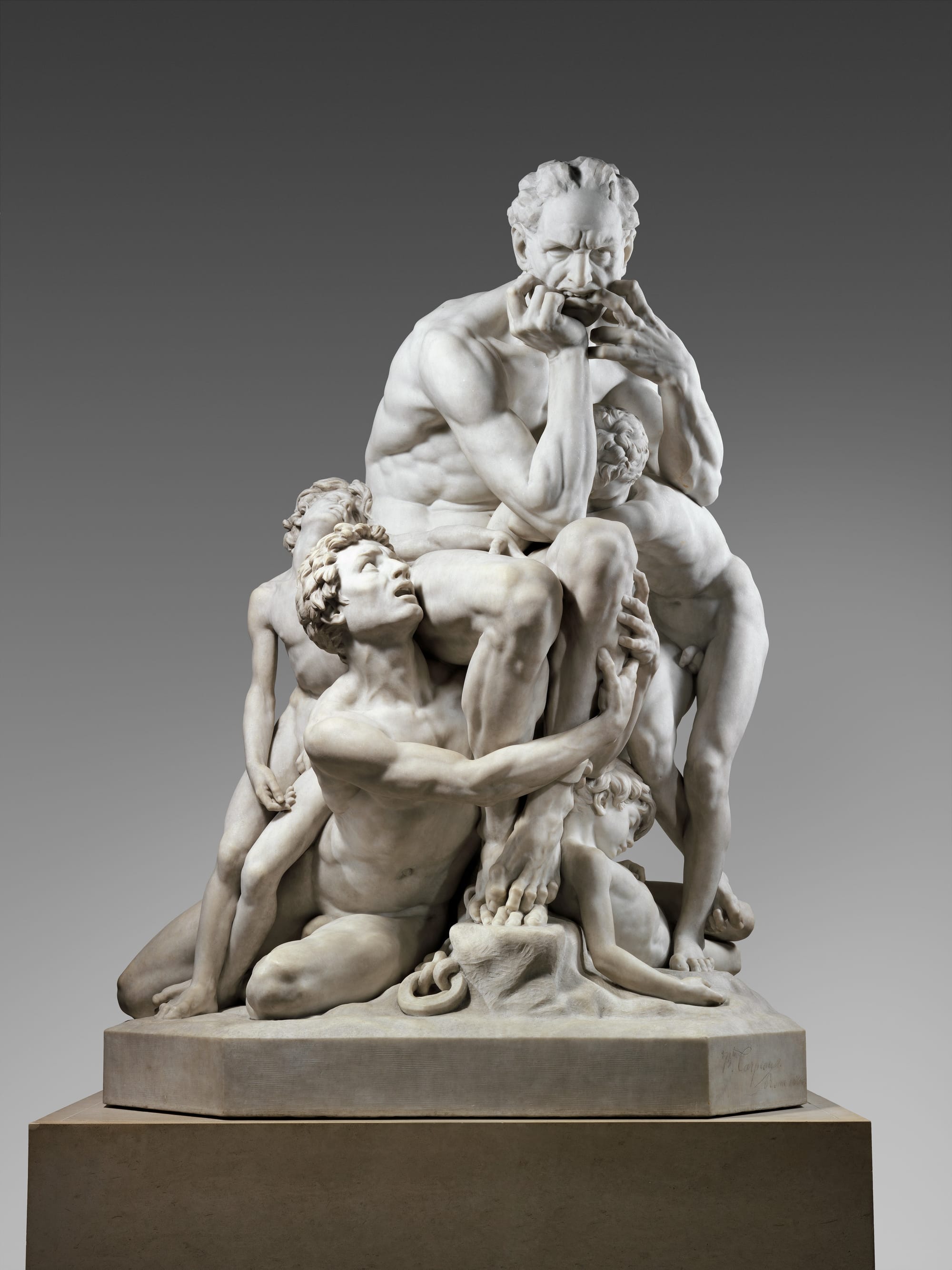 Jean-Baptiste Carpeaux’s Ugolino and His Sons sculpture showing figures emerging from marble, symbolizing subconscious identity formation and emotional memory imprinting.