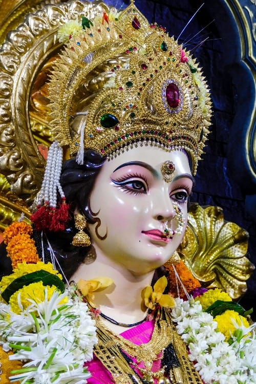 Close-up of Saraswati’s serene face, symbolizing divine wisdom, clarity, and subconscious awakening through Vedic manifestation.