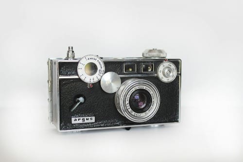 A vintage camera symbolizing Neville Goddard’s picture-taking technique, representing the power of imagination and reality creation.