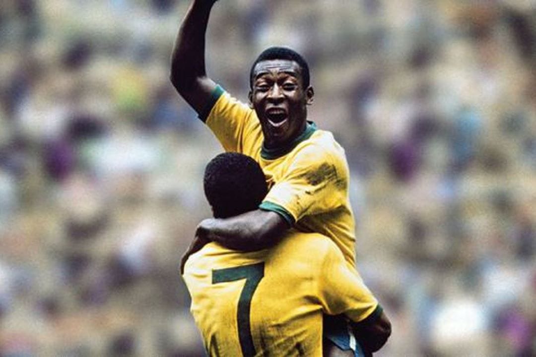 Pelé celebrating with joy in Brazil’s yellow kit, embodying imagination, play, and creative freedom at the peak of his football career.
