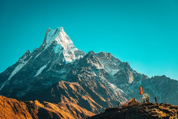 Golden sunrise over Himalayan peaks symbolizing Steve Jobs spiritual awakening and visionary insight on manifestation.