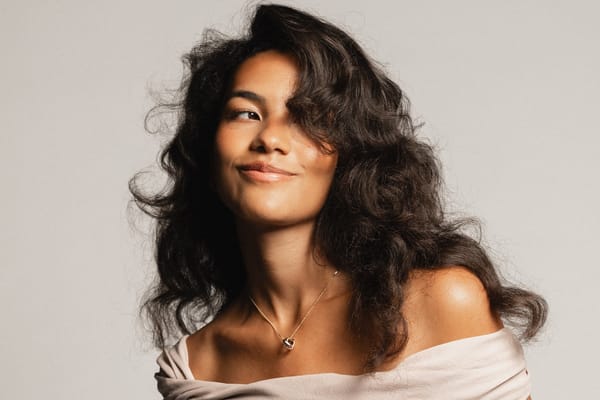 Olivia Dean portrait embodying soulful alignment and manifestation energy, reflecting love frequency, self-worth, and emotional authenticity.