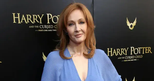 J.K. Rowling at a Harry Potter and the Cursed Child event, symbol of manifestation and the Law of Assumption through unwavering belief in her identity as an author.