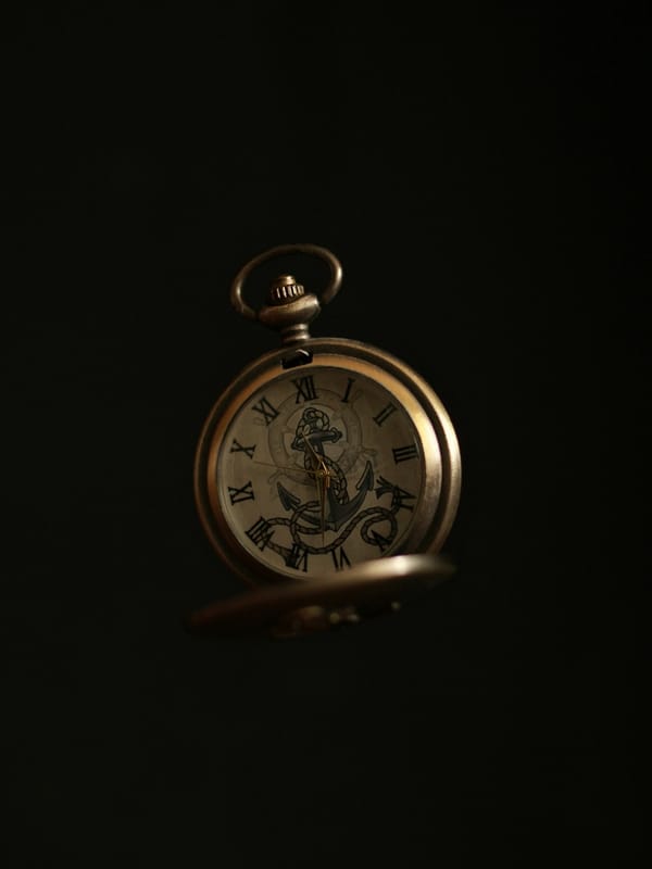 Vintage circular hand watch symbolizing time, memory, and the power of Neville Goddard’s Revision technique to reshape past experiences